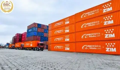 Alibaba shipping containers stacked for sea freight logistics and international transport.