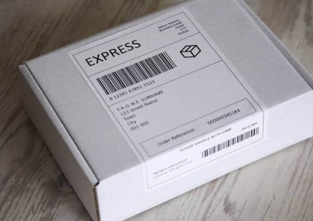 Express shipping box with Amazon FBA-style barcode label applied to the top surface