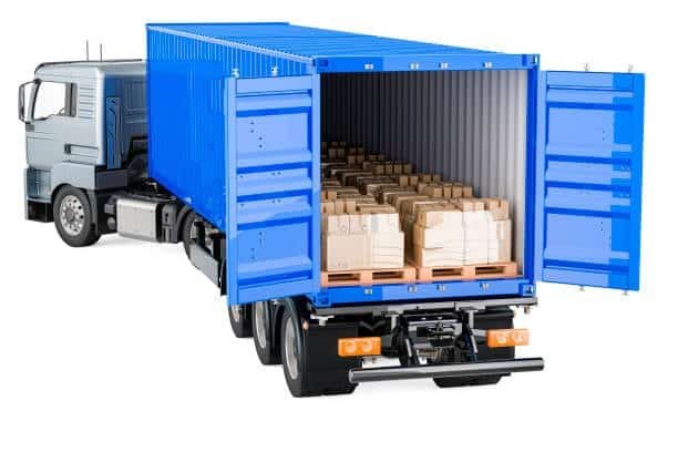 “Full container load (FCL) shipping truck with blue container carrying palletized cargo”