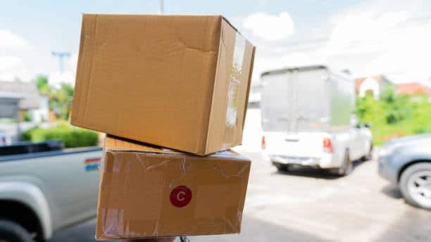 cardboard boxes ready for delivery illustrating CFR cost and freight shipping