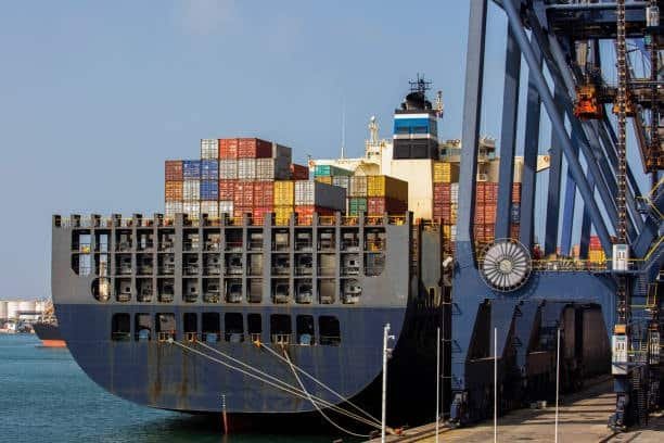 Import from Mexico cargo ship at port prepared for international shipping.