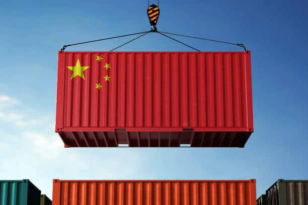 Red shipping container with China flag being lifted for express export transport