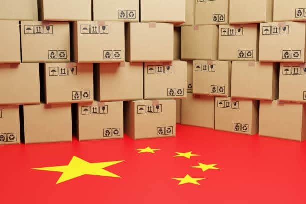 Packages stacked on China flag background representing express shipping from China