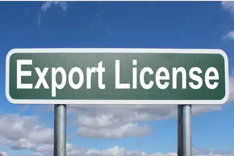 Green road sign with the words Export License representing export authorization.