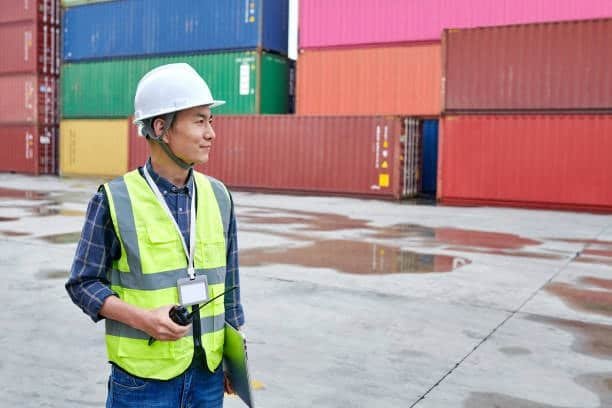 Logistics inspector checking containers for express shipping from China