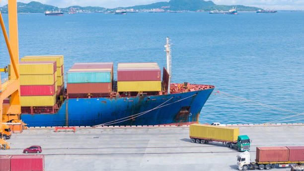 Container ship loading at Chinese port for international express shipping