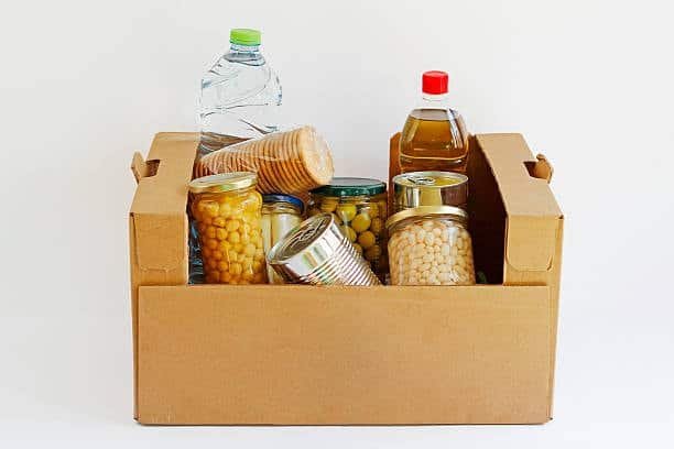 packaged food box with drinks and canned products for shipment