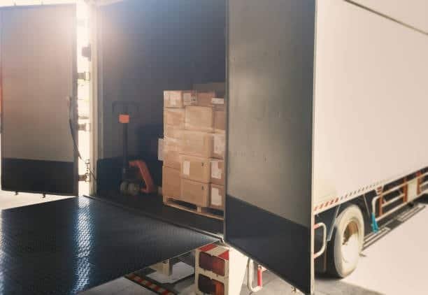“Pallet of cargo inside truck showing freight consolidation and container freight station costs”