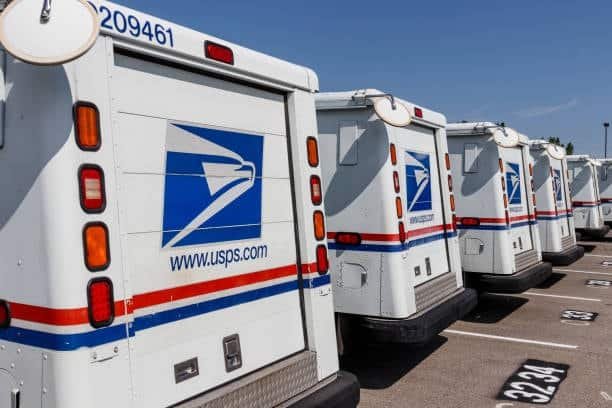 Discount on shipping with USPS vans offering affordable delivery services.