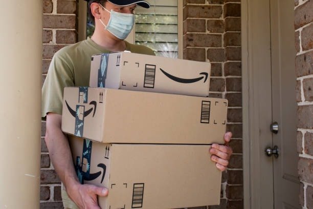Stack of Amazon delivery boxes showing correct labels, tape, and outer packaging