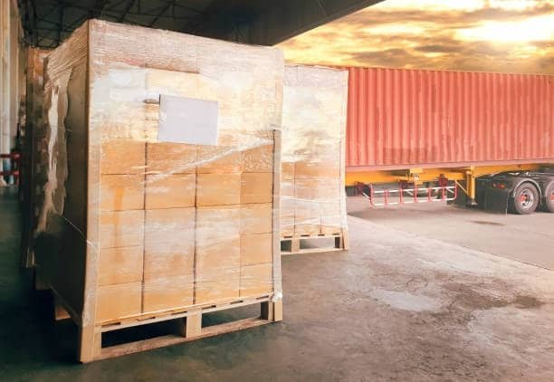 Export pallets placed outside warehouse after being cleared from customs