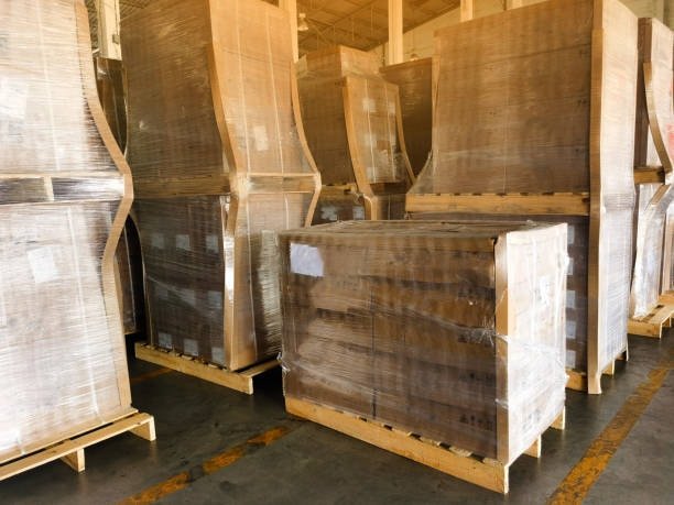 Large palletized cargo stored in warehouse after customs approval