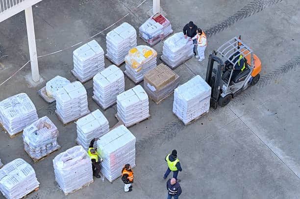 Organized pallets in warehouse awaiting final dispatch after customs clearance