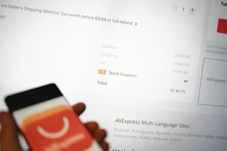 AliExpress checkout screen with subtotal shipping tax and store coupons.
