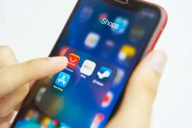 AliExpress app icon on mobile for online shopping and buyer reviews.