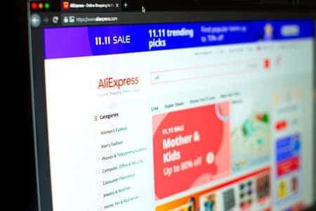 AliExpress sale event homepage with discounts and trending picks.