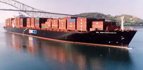 Large container vessel fully loaded with shipping containers demonstrating TEU measurement in maritime transport.