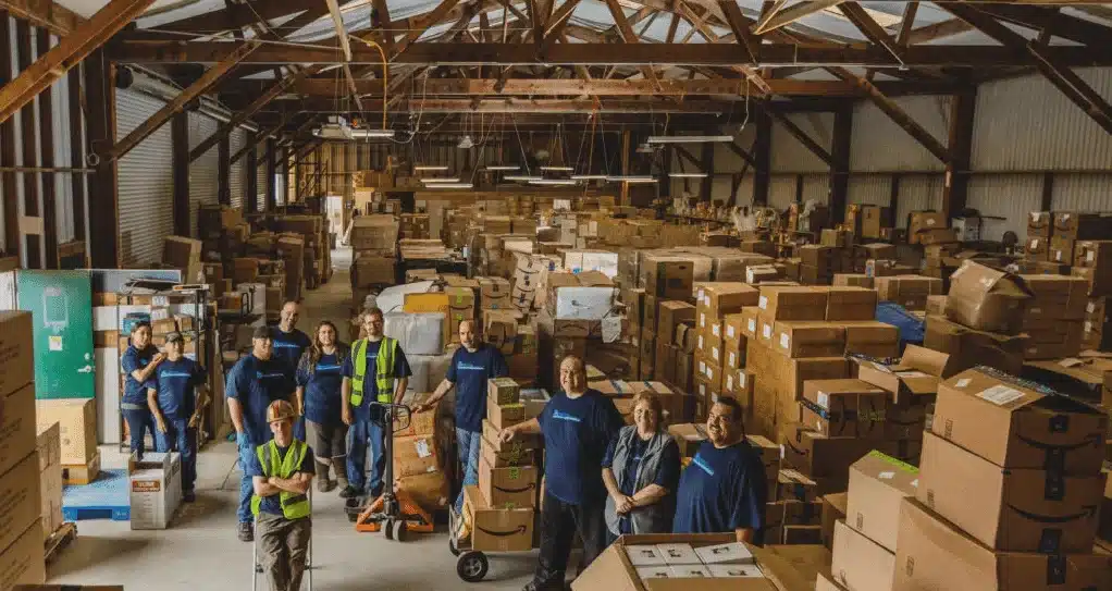 FBA prep center operations team managing inventory inspection and preparation for Amazon sellers