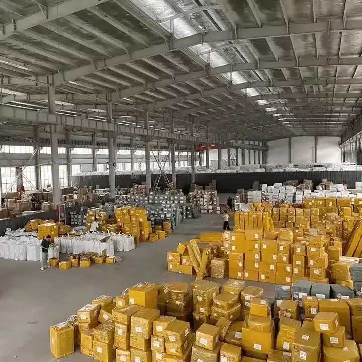 Large industrial warehouse in China filled with yellow-packaged inventory, showcasing free storage and high-volume fulfillment capability.