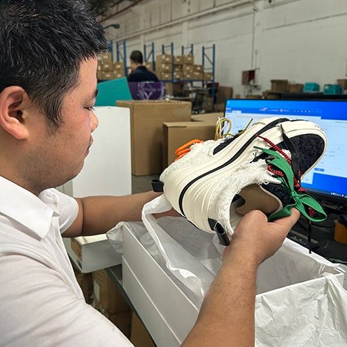 BM SUPPLY CHAIN staff inspecting product quality before warehousing and fulfillment