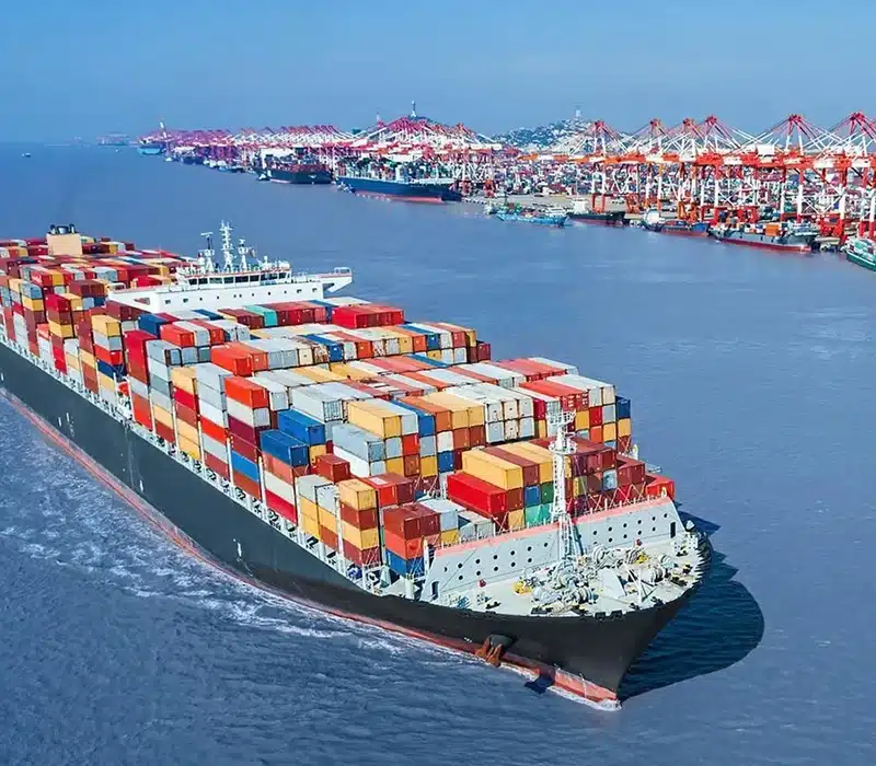 Large container ship departing a China port, representing global 3PL fulfillment, international shipping, and ecommerce logistics services.