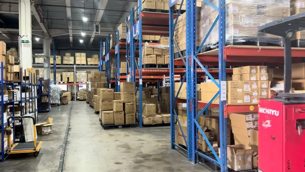 Organized China warehouse storing cartons for DDP shipping, customs clearance, and final delivery