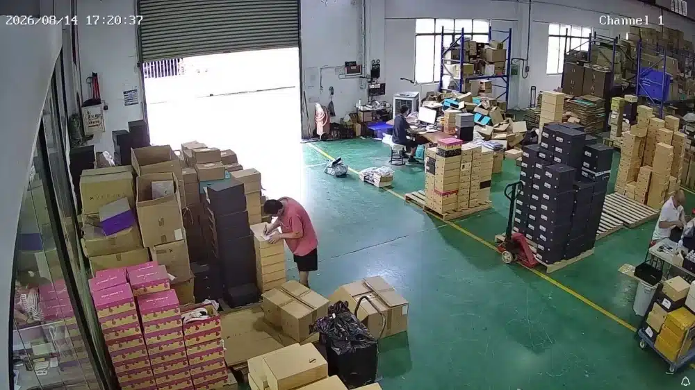 Warehouse staff processing and packing ecommerce orders for all-inclusive DDP shipping from China
