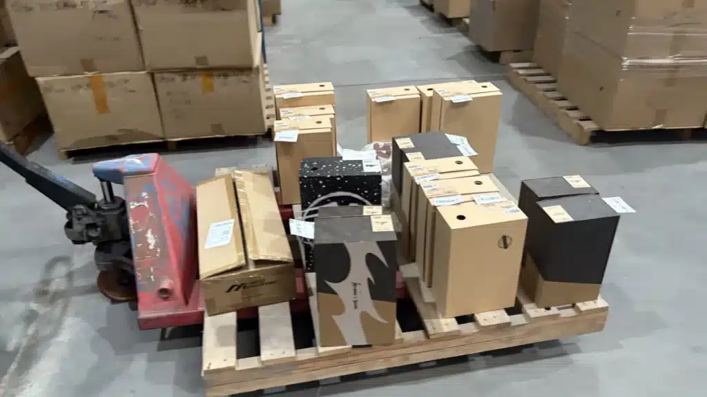 Labeled ecommerce inventory organized on a warehouse pallet for order fulfillment, illustrating how faster inventory turnover improves warehouse efficiency and reduces storage costs.