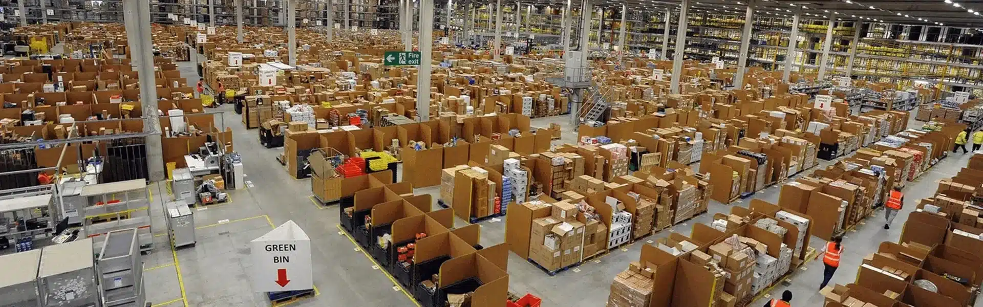 large scale ecommerce fulfillment warehouse handling high volume order processing and logistics operations