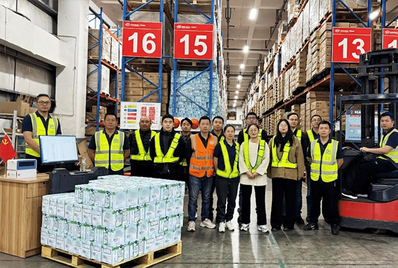 warehouse team in vietnam logistics fulfillment center with staff and inventory background