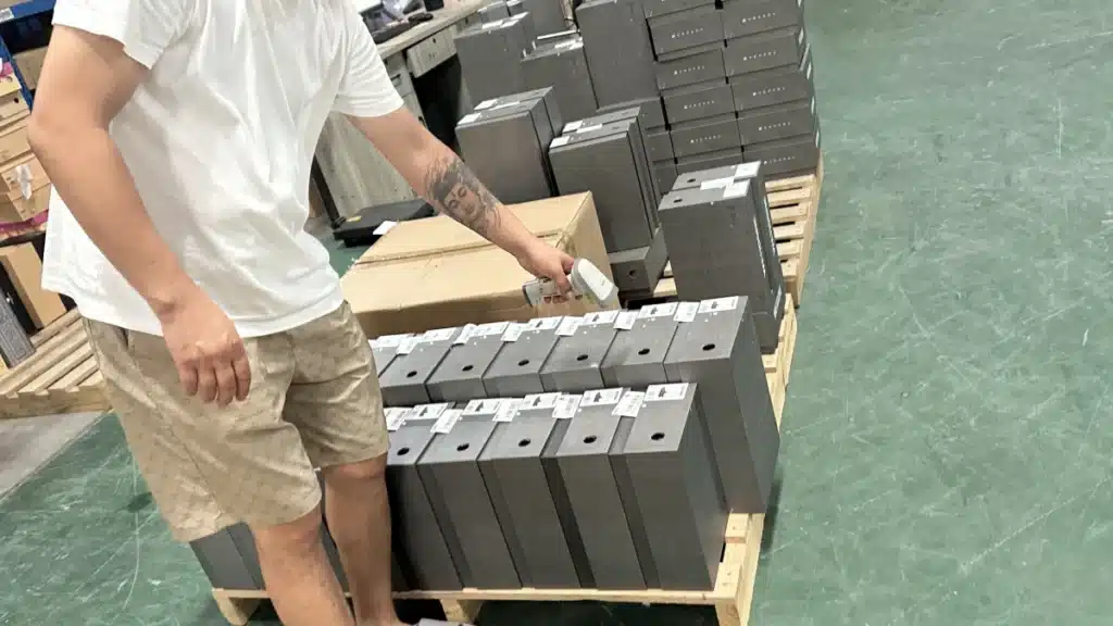 Warehouse worker scanning product barcodes during China 3PL fulfillment to maintain accurate inventory and real-time shipping tracking.