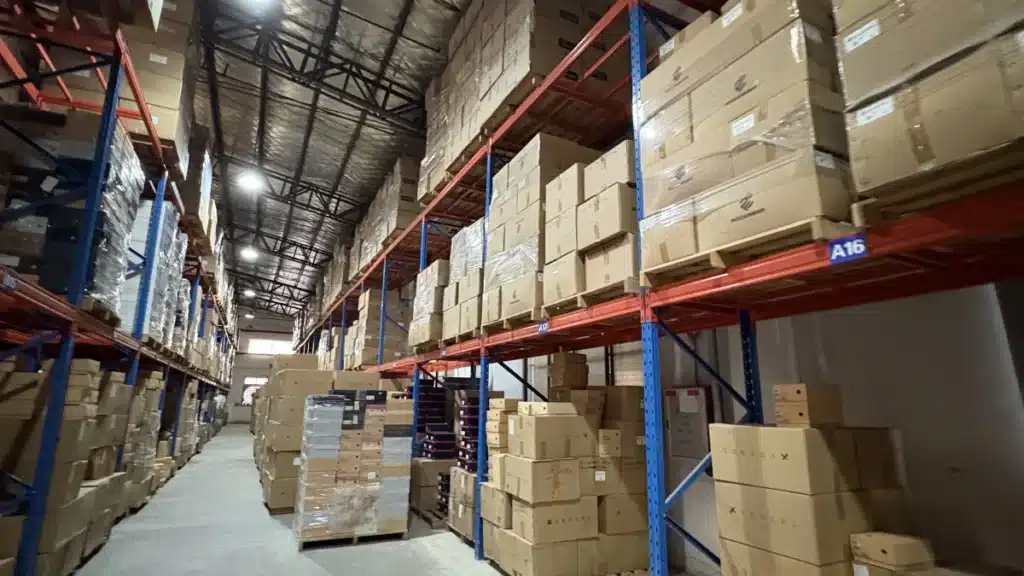 Ecommerce inventory stored on warehouse racks, showing how inventory turnover ratio and storage efficiency affect fulfillment costs and cash flow.