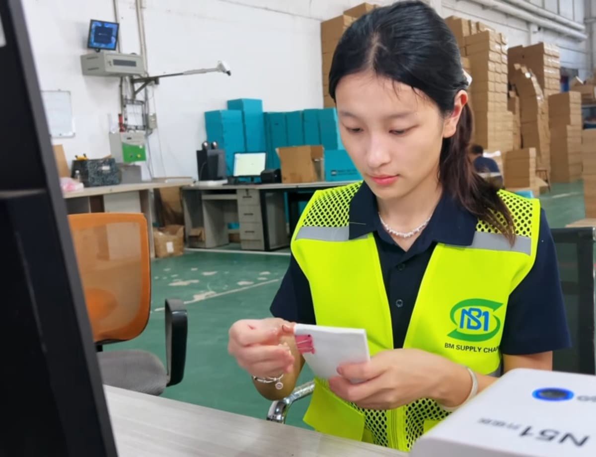 ecommerce fulfillment warehouse worker packing orders in China BM Supply Chain