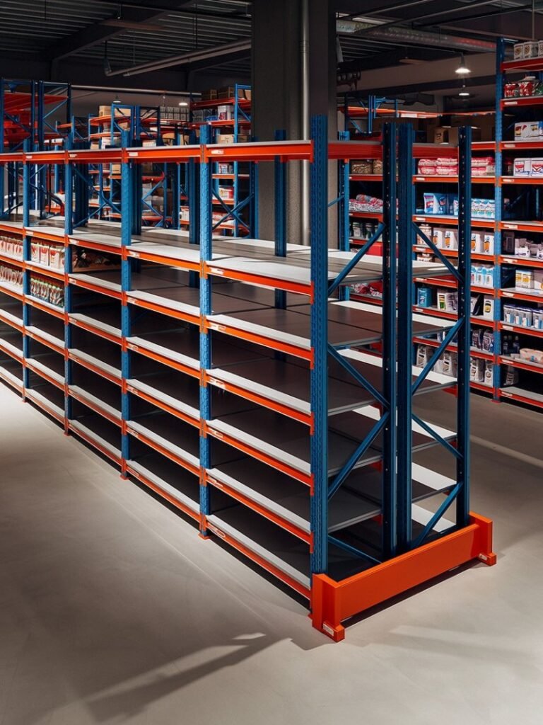 Clean warehouse aisle with selective pallet racking, designed to minimize travel time for pickers during the order fulfillment process.