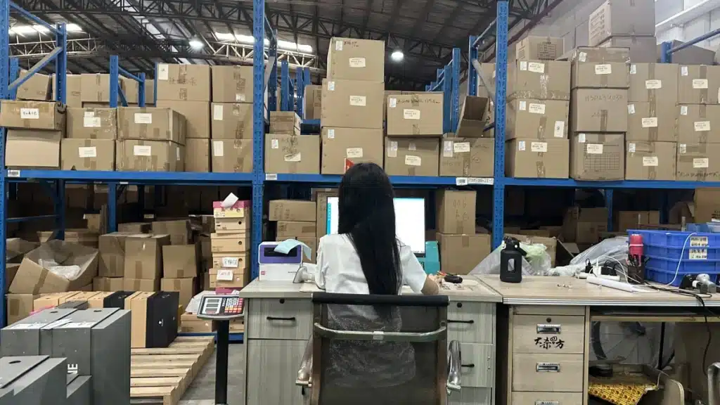 3PL warehouse staff managing ecommerce orders through a warehouse system to process gift messages, special instructions, and customized fulfillment requests.