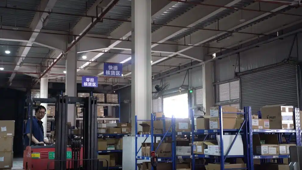 China pick and pack fulfillment provider operating an organized warehouse with forklifts, inventory zones, and eCommerce products
