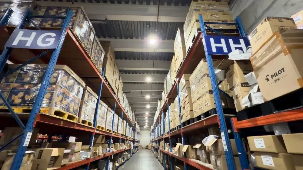 Warehouse staff checking inventory locations in a China pick and pack fulfillment center for accurate eCommerce order processing