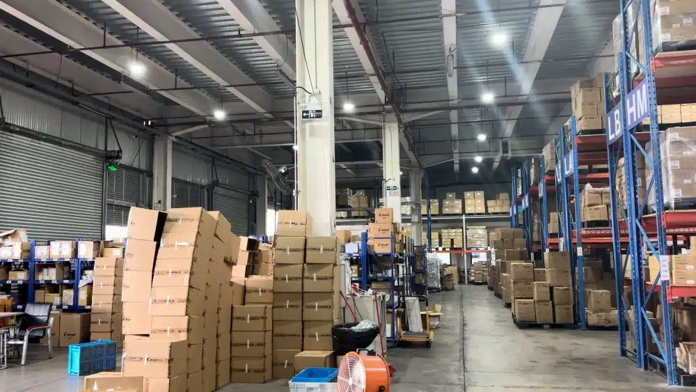 China warehouse storing cartons and supplier inventory sourced through Alibaba and Made-in-China for international B2B buyers