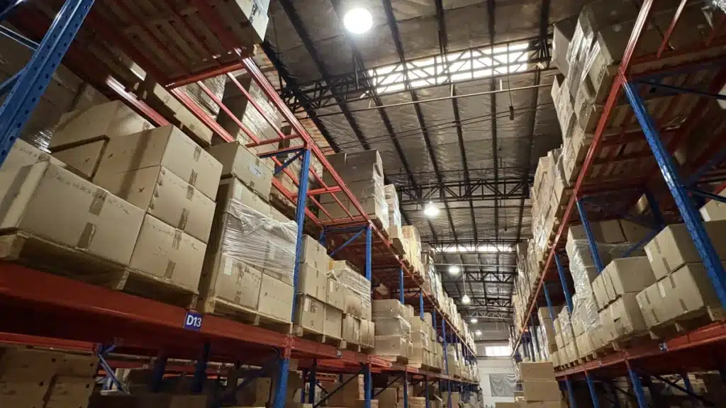 Palletized cartons stored on warehouse racking, demonstrating organized inventory storage, space utilization, and scalable warehousing services for eCommerce businesses.