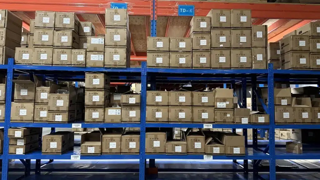 Labeled inventory cartons arranged on warehouse shelving for accurate stock tracking, SKU organization, and efficient inventory management.