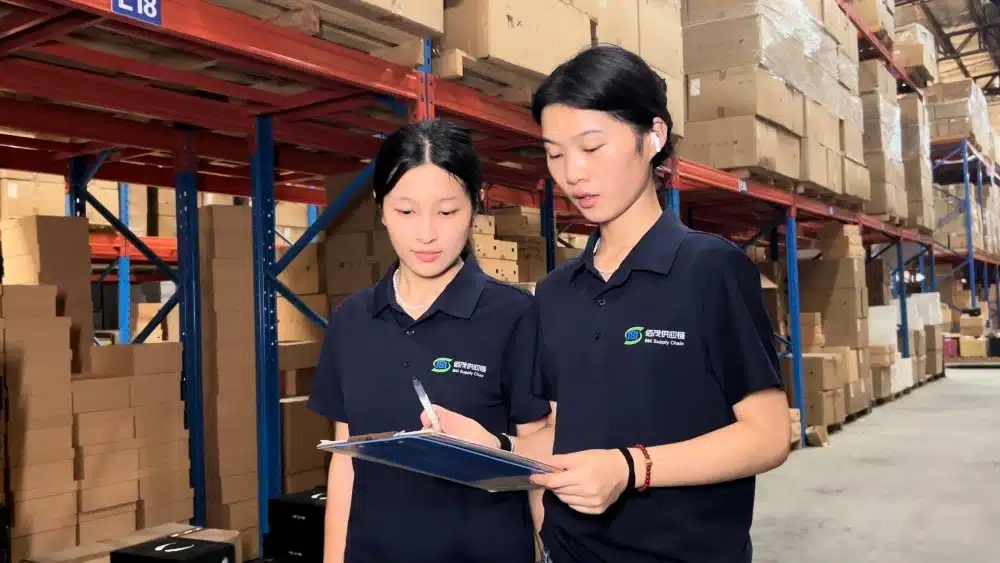 Warehouse staff checking supplier inventory for products sourced from Alibaba and Made-in-China as part of China B2B sourcing and quality control