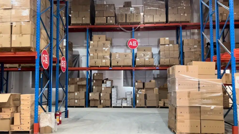 Warehouse worker picking products from inventory for eCommerce pick and pack fulfillment and order preparation