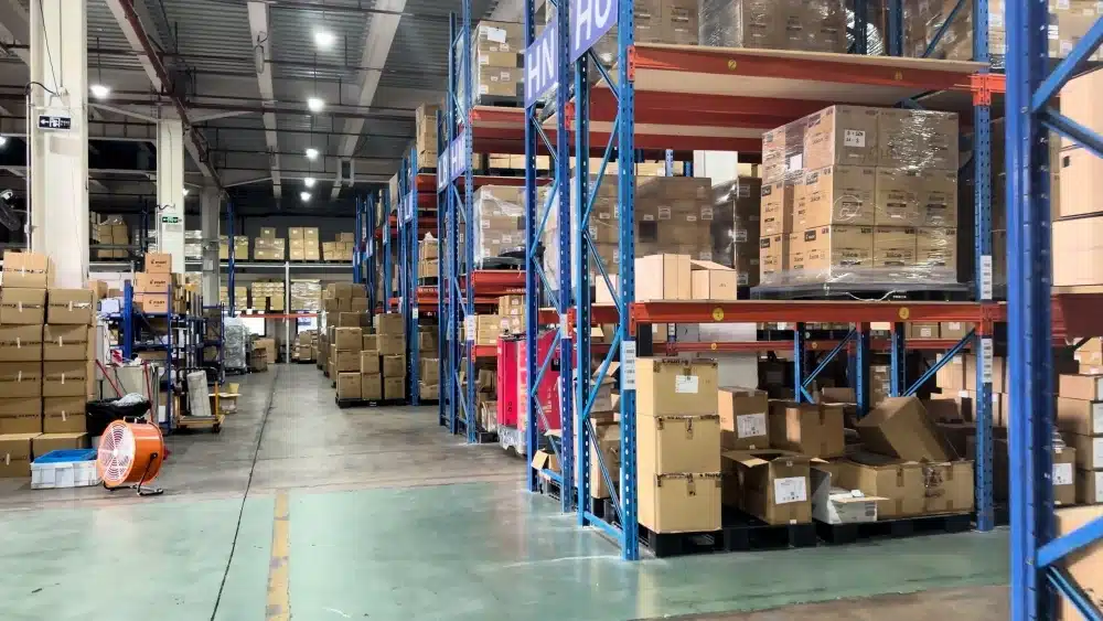 Fulfillment warehouse with organized pallet racks and inventory supporting integrated warehousing and order fulfillment for growing eCommerce businesses