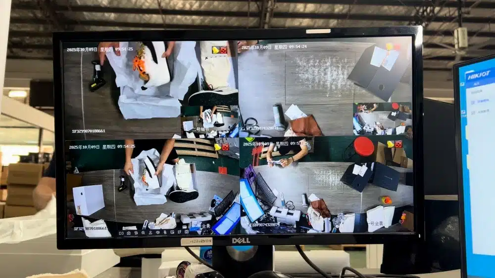 Fulfillment center monitoring order packing and processing operations for accurate eCommerce fulfillment and customer order shipping