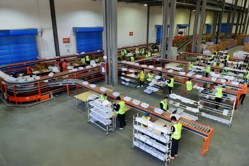 Workers sorting packages on conveyor belts in a modern Chinese fulfillment center, illustrating scalable logistics operations beyond basic storage.
