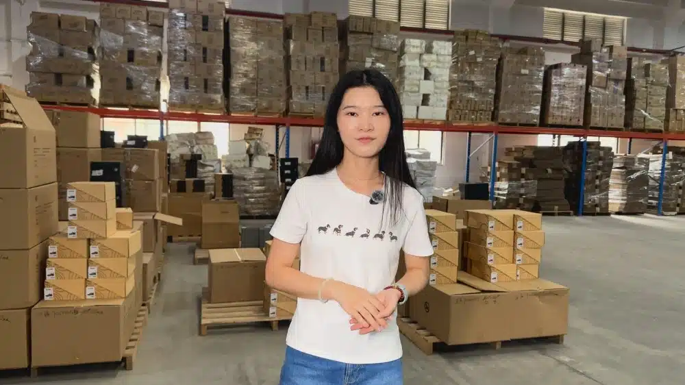 Warehouse staff organizing stored products with inventory management processes for eCommerce fulfillment