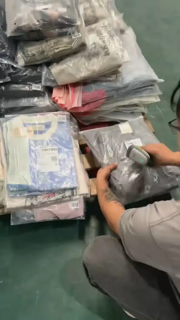 Warehouse staff using barcode scanning to manage TikTok Shop inventory and improve order fulfillment accuracy