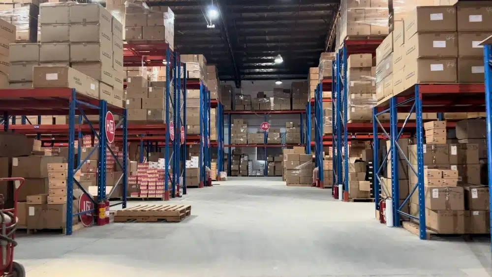 Large ecommerce fulfillment warehouse with organized inventory storage supporting fast TikTok Shop and Amazon order fulfillment
