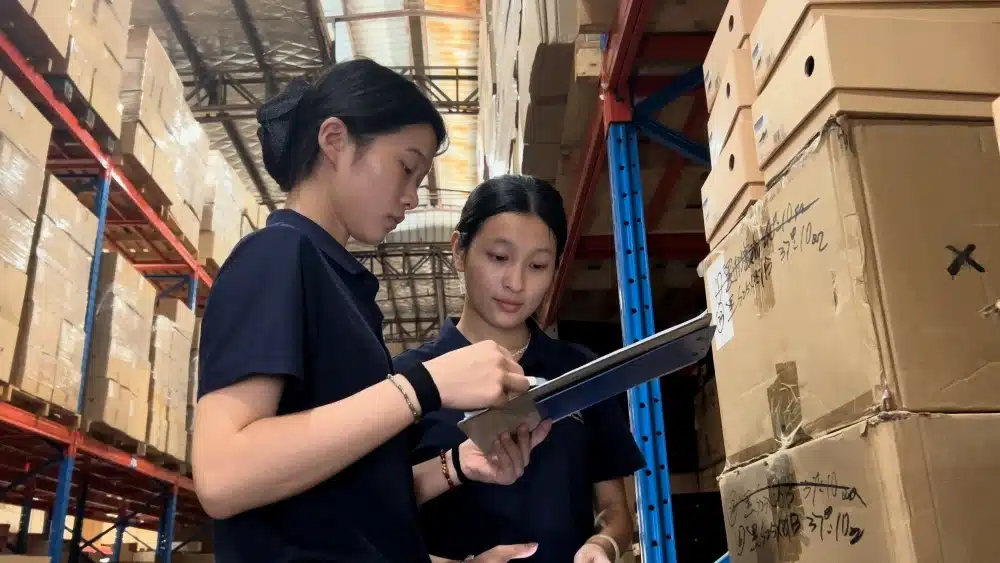 Fulfillment team checking warehouse inventory to ensure quality control, sustainable operations, and transparent supply chain management