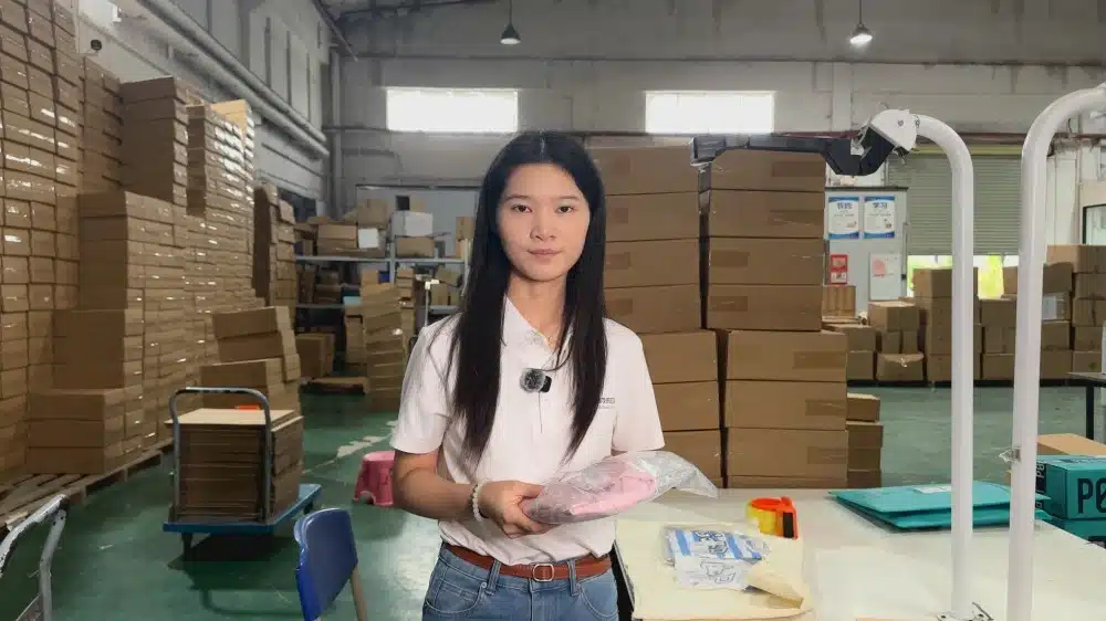 Warehouse worker preparing ecommerce products for dropshipping fulfillment with inventory storage and professional packing services